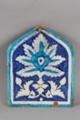 A 18TH-19TH CENTURY NORTH INDIAN MULTAN POTTERY TILE, 25cm.