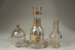TWO 19TH CENTURY OTTOMAN MARKET GILDED GLASS HUQQA BASES, and another 19th century Ottoman Turkish