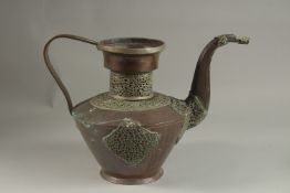 A LARGE 19TH CENTURY TIBETAN WHITE METAL MOUNTED COPPER EWER, 29cm high.