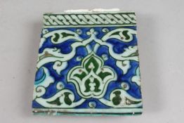 A FINE 16TH CENTURY OTTOMAN TURKISH IZNIK TILE, 13.5cm x 15cm.