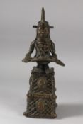 A BENIN FIGURAL BRONZE BELL, 38cm high.