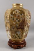 A FINE AND LARGE JAPANESE KINKOZAN GILDED HEXAGONAL SATSUMA VASE ON HARDWOOD STAND, finely painted