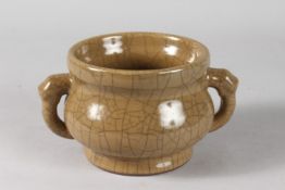 A CHINESE CRACKLE GLAZE PORCELAIN TWIN HANDLE CENSER, 10cm high, 18cm wide (handle to handle).