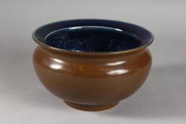 A CHINESE CAFE AU LAIT AND BLUE GLAZED PORCELAIN CENSER BOWL, with incised dragons to interior, 19.