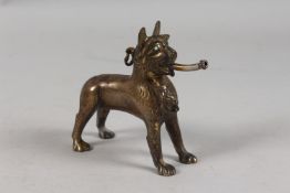 A RARE EARLY ISLAMIC LION SHAPED AQUAMANILE POURING VESSEL, with turquoise inset eyes, 13cm high.