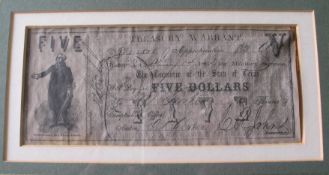 A framed U.S. five-dollar bill 1862.
