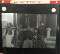 CHINA, PHOTOGRAPHY. Group of 37 glass lantern slides, circa 1920s, in red cloth box.