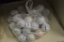 A quantity of golf balls.