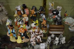 A collection of Beswick animal musicians.