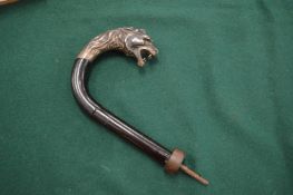 A good parasol or walking stick handle, the white metal mount modelled as a lions head.
