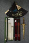 Conductors batons, cased together with a Commemorative presentation dagger and two fans.