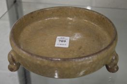 A crackle glazed circular large brush washer.