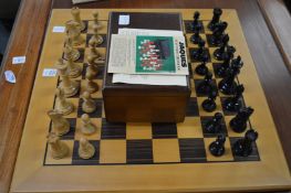 A Jaques Staunton chess set and board.