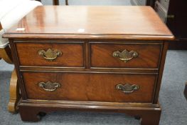 A mahogany TV stand.