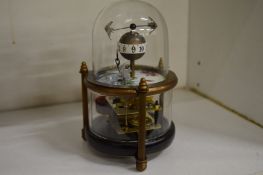 A novelty aquarium clock.