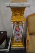 A good impressive pair of floral decorated ormolu and marble mounted columns.