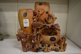 A Chinese carved soap stone vase group.