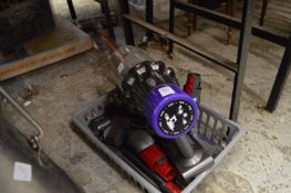 A Dyson rechargeable vacuum cleaner.