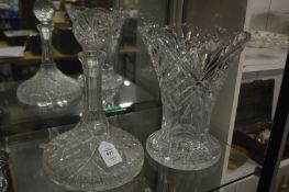 A ships decanter and a large cut glass vase.