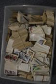 A quantity of cigarette cards.