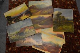 A small group of oil paintings, mostly unframed.
