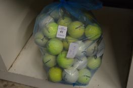 A quantity of golf balls.