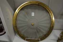 A frosted glass and metal mounted ceiling shade.