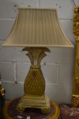 A pair of pottery table lamps modelled as stylised pineapple.