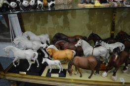 A good large collection of Beswick and other model horses.