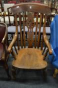 A Windsor armchair (cut down).