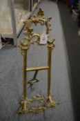 A brass easel.