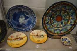 Decorative plates to include Doulton and others and a large colourful charger.