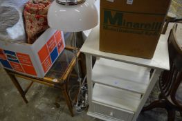 A white painted display stand and other items.