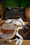 Various textiles, gloves etc and an old typewriter.