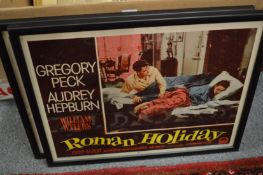 A group of reproduction prints and posters.