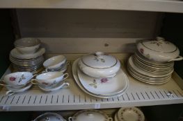 A Continental part dinner service decorated with roses.