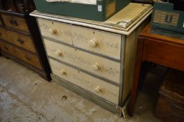 A painted pine chest of drawers.