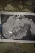 An unframed print of Marilyn Monroe.