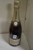 A bottle of Louis Roederer collection 244 champagne.