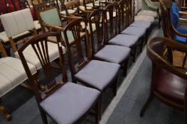 A set of six mahogany dining chairs.