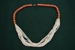 Coral bead necklace.