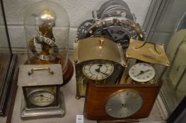 A collection of mantel clocks etc.