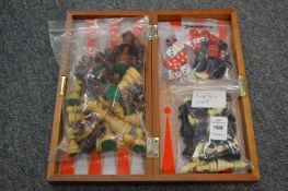 Travelling games board and games pieces.