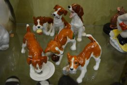 A collection of Beswick playful puppies.