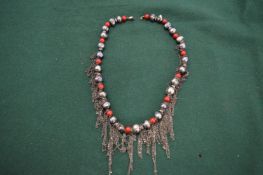 Decorative bead necklace.
