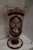 A Bohemian ruby tinted cut glass pedestal vase.