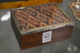 A silver mounted box and cover.