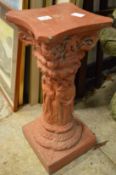 A column style pottery stand.