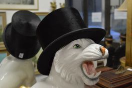 A Locke & Co black silk top hat, boxed, internal size 20cm x 16cm.