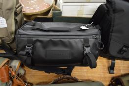 A Wandrd large nylon waist bag.